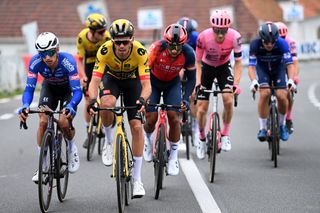 WAREGEM BELGIUM MARCH 29 LR Quinten Hermans of Belgium and Team AlpecinDeceuninck Christophe Laporte of France and Team JumboVisma and Jhonatan Narvez of Ecuador and Team INEOS Grenadiers compete in the chase group during the 77th Dwars Door Vlaanderen 2023 Mens Elite a 1837km one day race from Roeselare to Waregem DDV23 on March 29 2023 in Waregem Belgium Photo by Tim de WaeleGetty Images