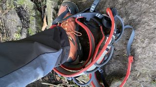 How to put on a climbing harness: stepping in