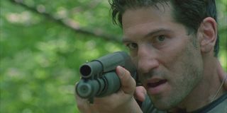 Shane holding a shotgun in The Walking Dead