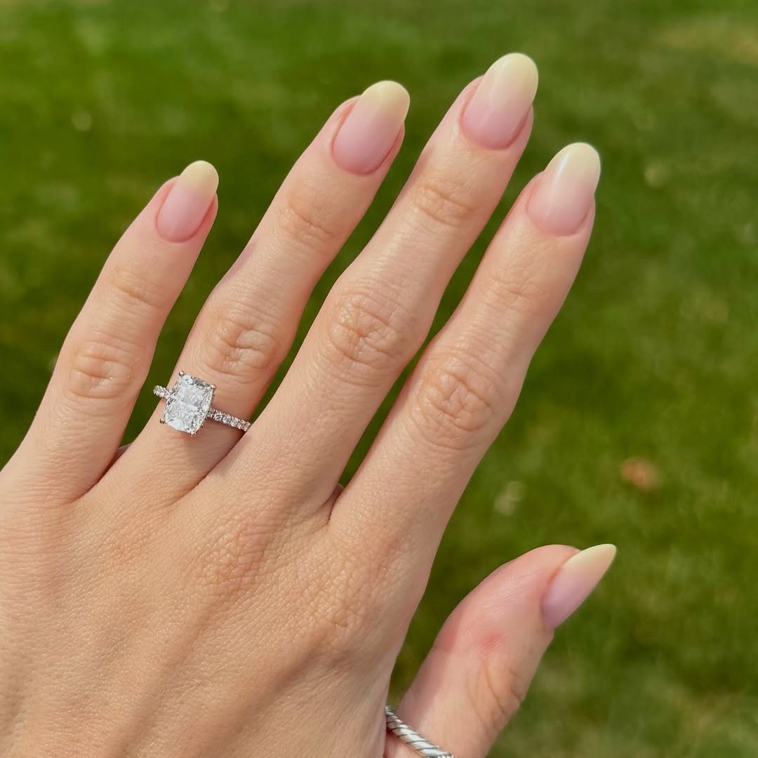A nude manicure that transitions from yellow to pinky nude ombre.