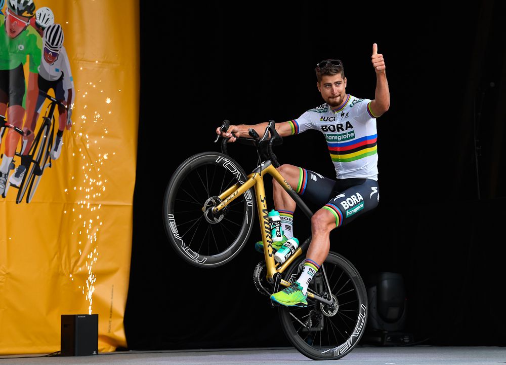Peter Sagan and his trademark wheelie at the 2018 Tour de France team presentation
