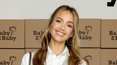 Jessica Alba wearing a white shirt and dress