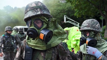 South Korean soldiers train for a surprise nuclear atack