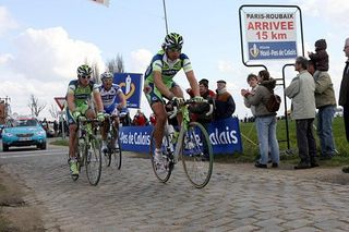 Pozzato was dropped after a crash then fought back, but eventually had to surrender.