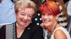 Annie Arscott with her short red hair, with a friend