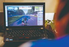 Cyclist watches screen on Zwift