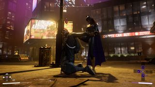 Batgirl interrogates criminal in Gotham Knights