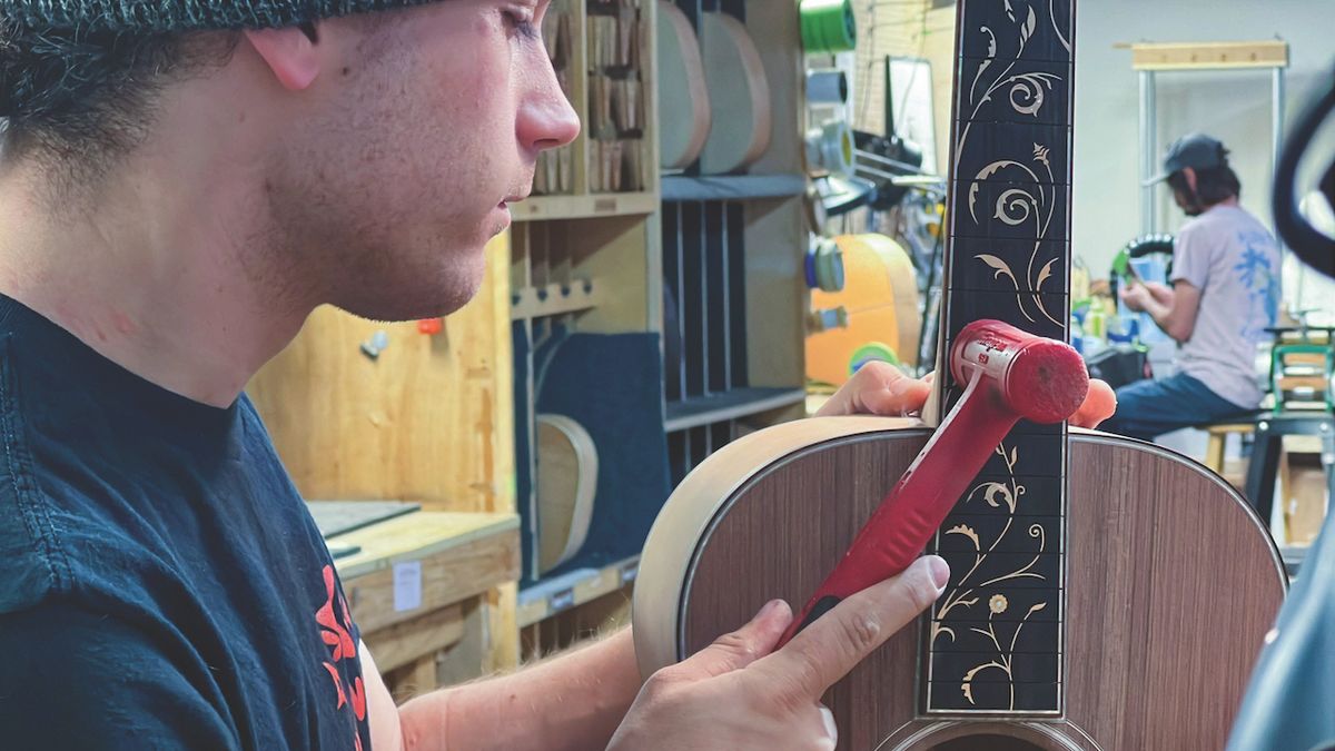 The 45-style fingerboard is fitted to the H13 1854 body, featuring ancient kauri back and sides and a top of Purple San Lorenzo sinker redwood.