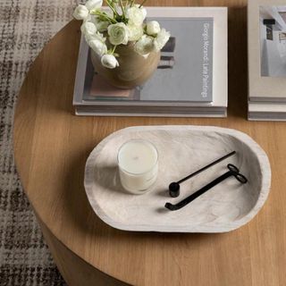 A white wooden tray from McGee & Co. on a coffee table