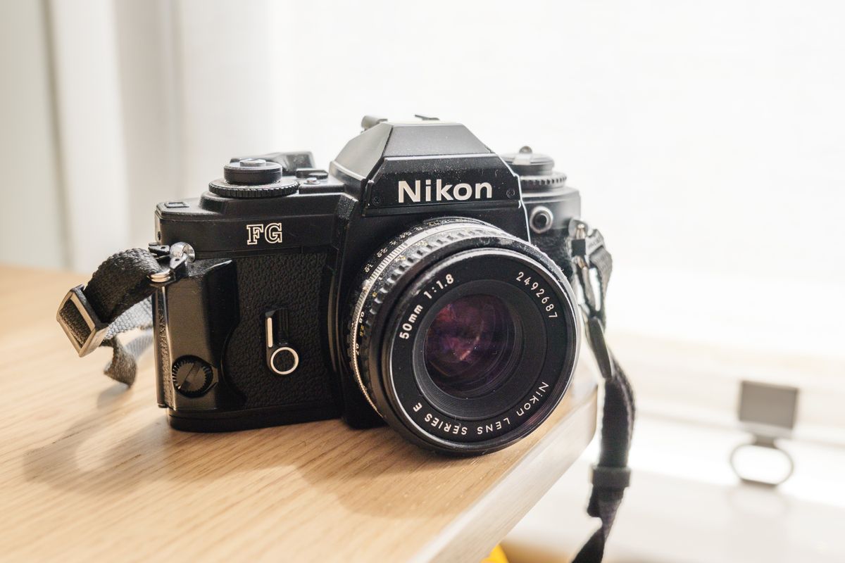 A backlit photo of a Nikon FG taken on the Panasonic Lumix S9