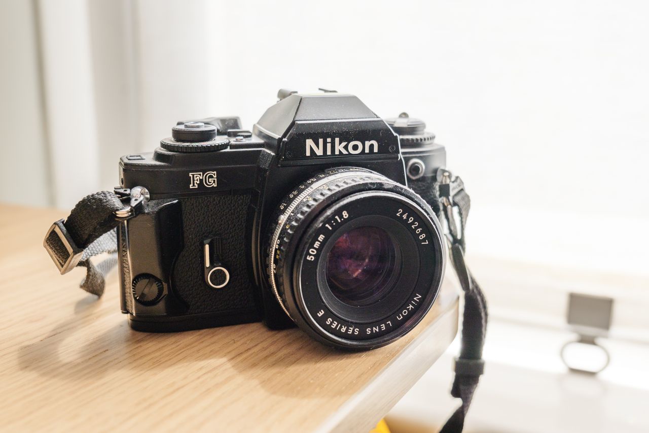A backlit photo of a Nikon FG taken on the Panasonic Lumix S9