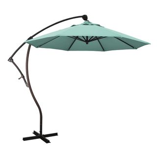 A sage green cantilever umbrella