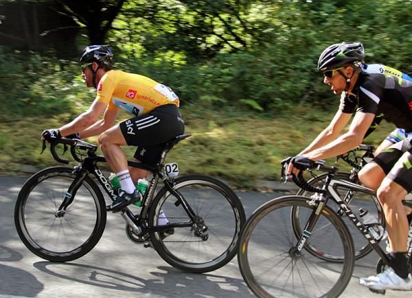 Mark Cavendish (Sky) in the leader's gold jersey.