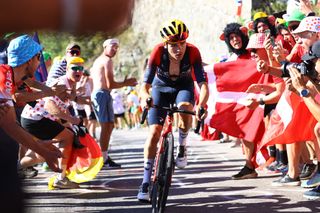 ALPE D'HUEZ, FRANCE - JULY 14: Thomas Pidcock of United Kingdom and Team INEOS Grenadiers competes passing through The Dutch corner climbing to the L'Alpe d'Huez during the 109th Tour de France 2022, Stage 12 a 165,1km stage from Briançon to L'Alpe d'Huez 1471m / #TDF2022 / #WorldTour / on July 14, 2022 in Alpe d'Huez, France. (Photo by Michael Steele/Getty Images)