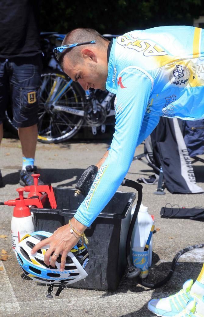 Agnoli gives his helmet a freshen up after the day's ride