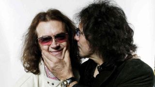 Glenn Hughes and Tony Iommi posing for a photograph