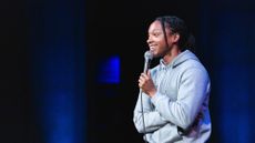 Comedian Josh Johnson performs a stand-up routine at a show in Austin, Texas.