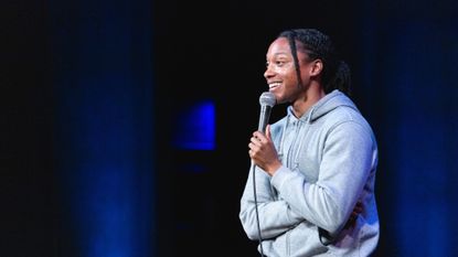 Comedian Josh Johnson performs a stand-up routine at a show in Austin, Texas.