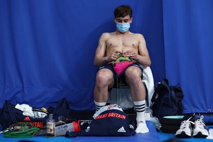 Tom Daley knits poolside during the Tokyo 2020 Olympic Games
