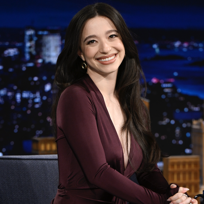 Actress Mikey Madison arrives on Wednesday, January 8, 2025 to the The Tonight Show Starring Jimmy Fallon wearing a plum dress and feathered heels