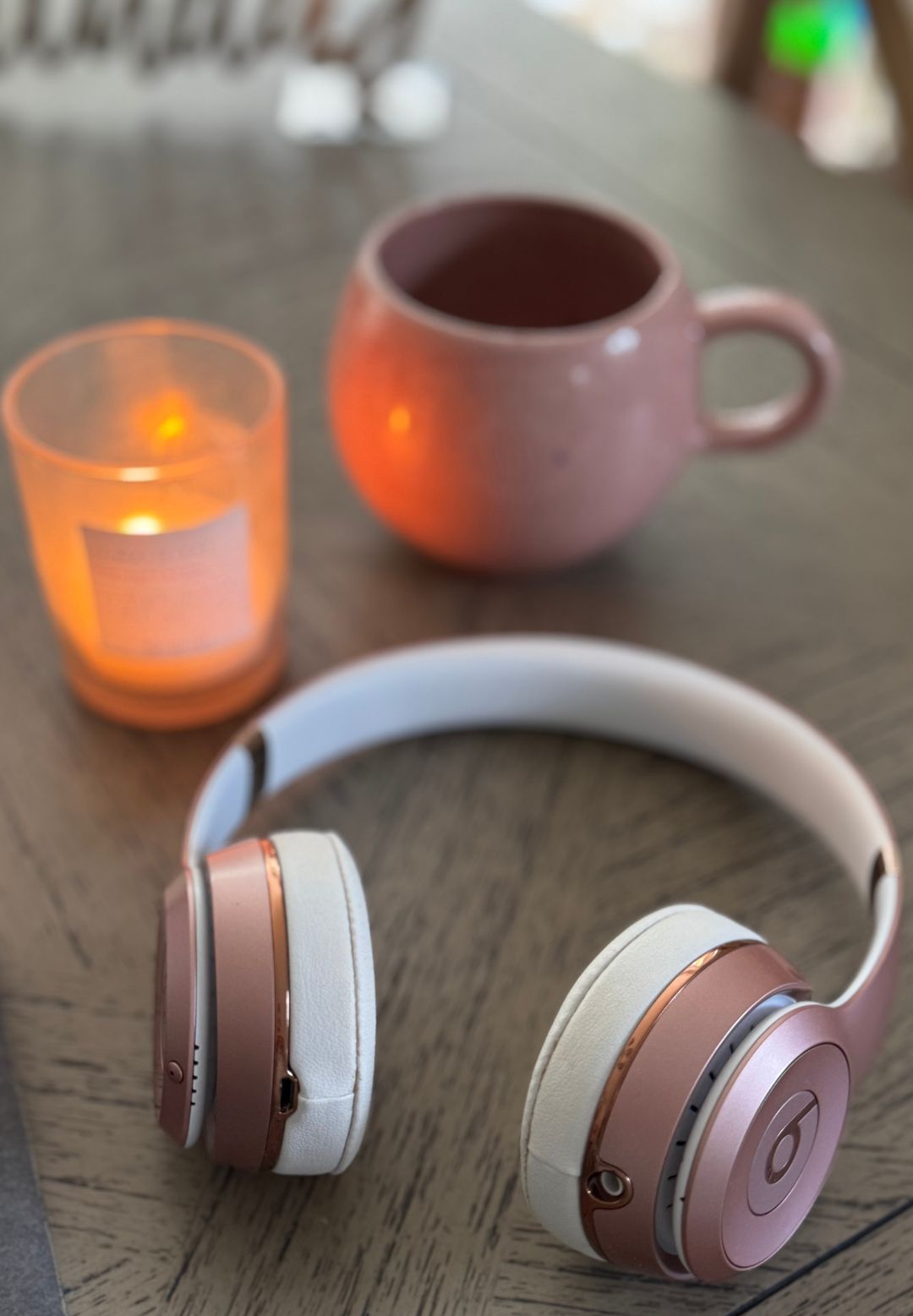 Health writer Anna Barrter's headphones during her week of listening to Able Heart's manifesting music