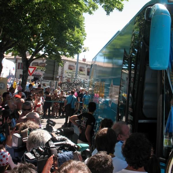Many people gathered at the Astana team bus, waiting for Alberto Contador
