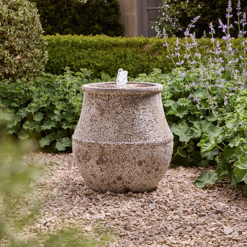 stone water feature in garden