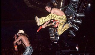David Lee Roth and Eddie Van Halen perform onstage with Van Halen in San Diego, California on May 21, 1984