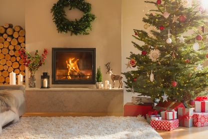 Christmas tree in a living space with woodburning stove