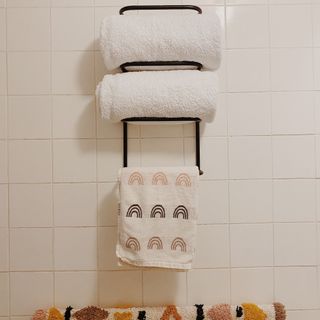 Habitat Wall Mountable Towel Holder in Annie's bathroom with towels on