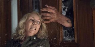 Laurie fighting off Michael in Halloween