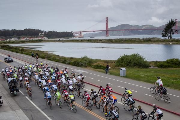 The race rolls out of San Francisco and past the Golden Gate Bridge