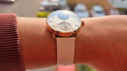 a close-up picture of our reviewer wearing the Withings ScanWatch 2