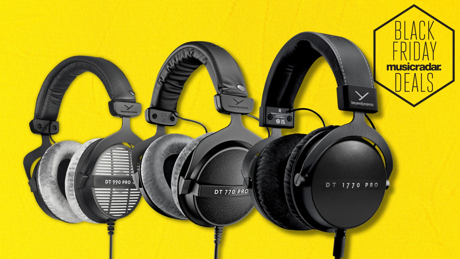 Three pairs of Beyerdynamic studio headphones on a yellow textured background