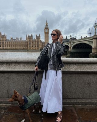 @ruerodier wearing a white skirt, striped t-shirt and sandals