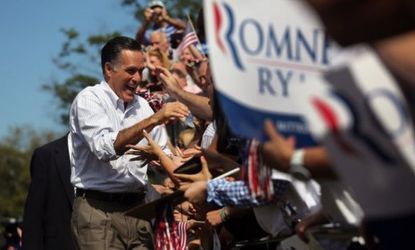 Mitt Romney greets supporters during a campaign stop in New Hampshire on Aug. 20: Romney out-raised President Obama in July by roughly $25 million.