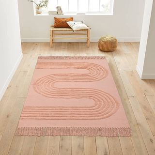 A boho chic style pink rug