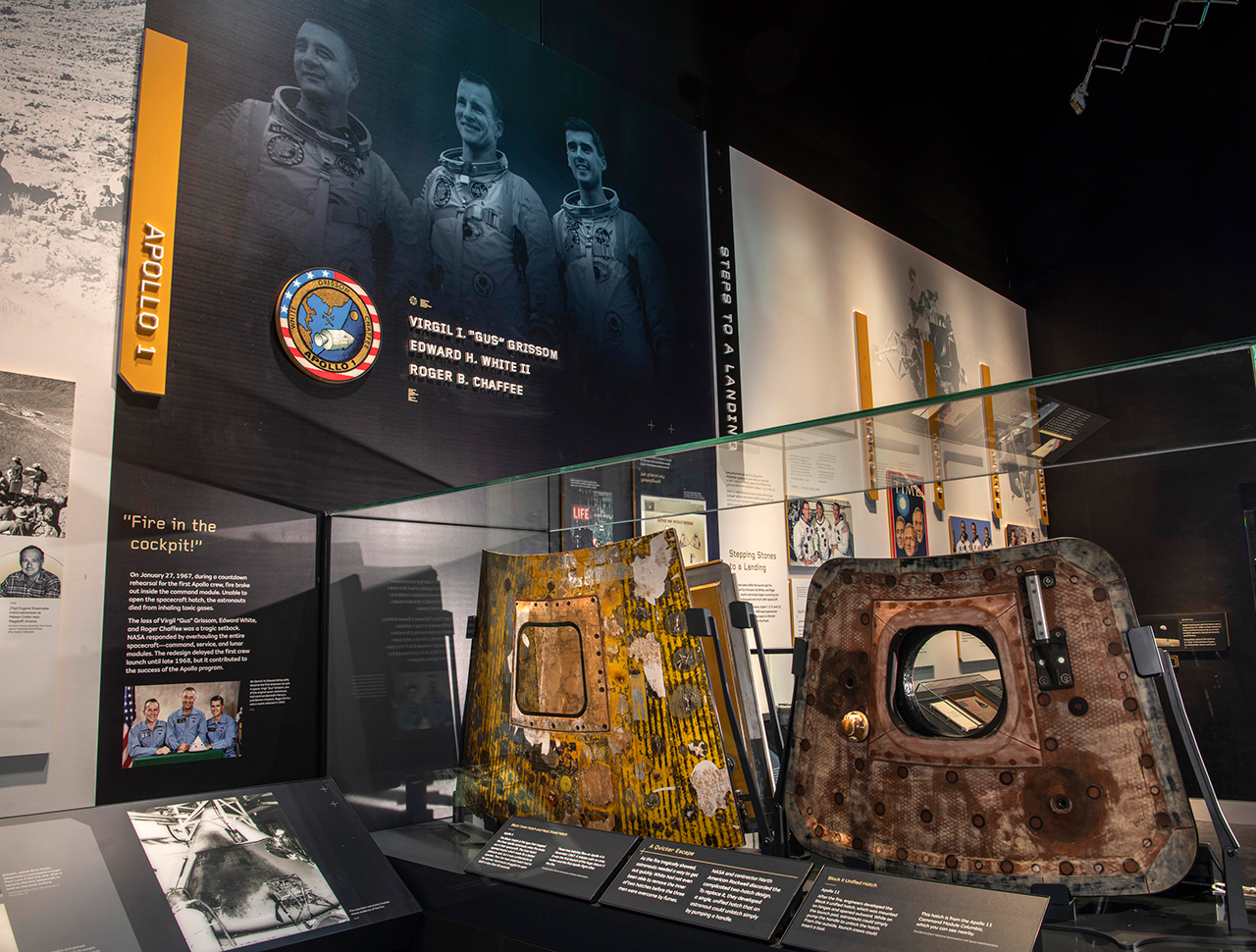 The Apollo 4 command module inner and heat shield hatches are on exhibit next to the Apollo 11 command module hatch in the 
