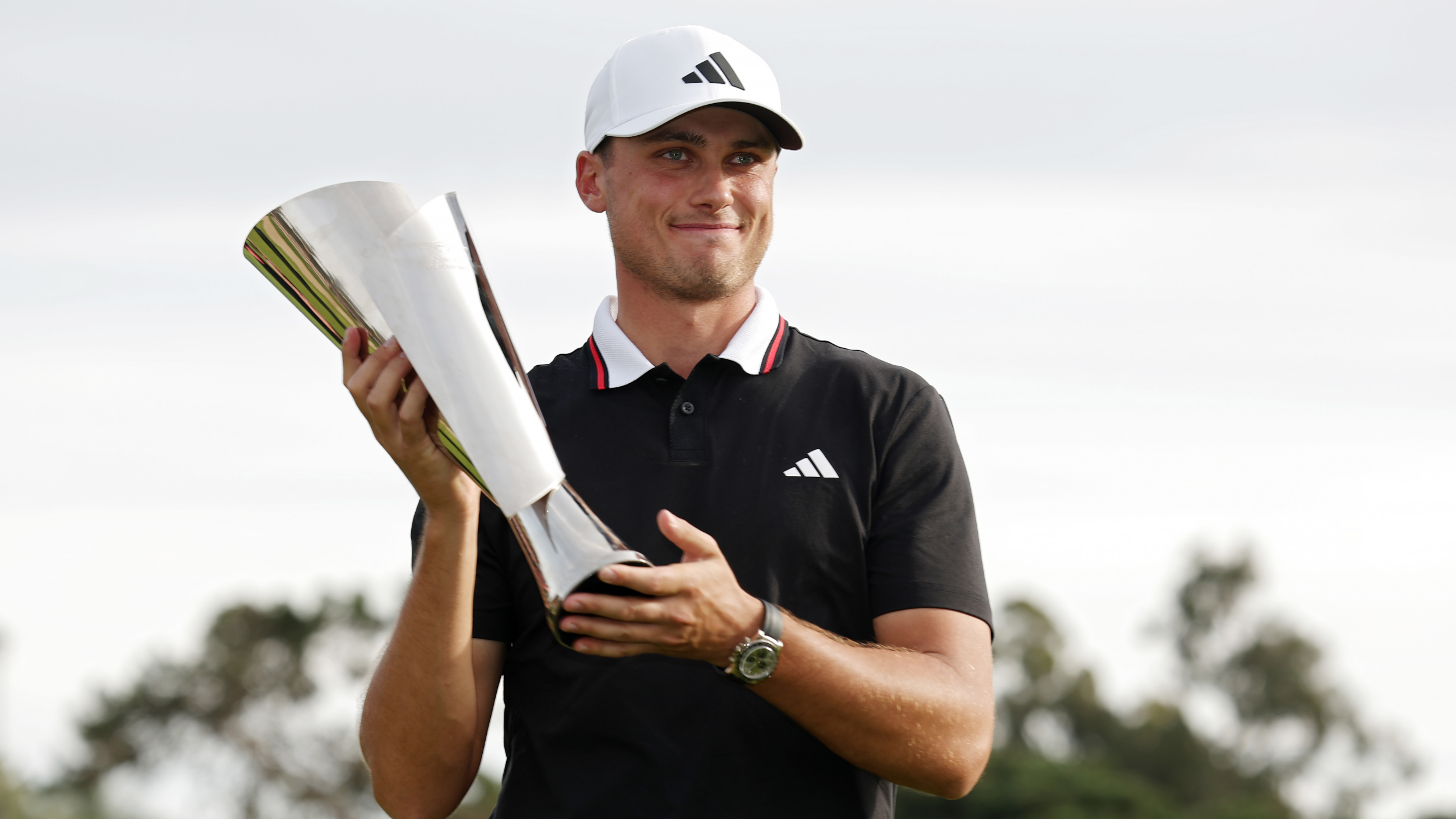 Ludvig Aberg celebrates victory at the Genesis Invitational in 2025.