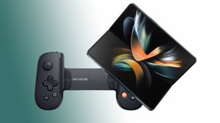 Samsung Galaxy Z Fold 4 next to Backbone One controller and green backdrop