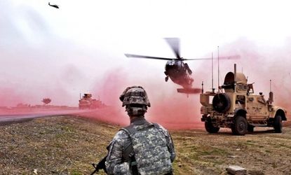 A Black Hawk helicopter lands in Afghanistan: The military is putting $4 million behind a divide mounted on to vehicles that will cause on-field hallucinations.