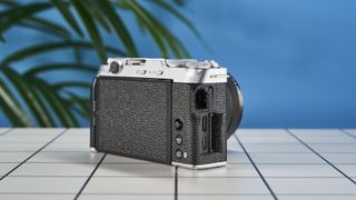 A Fujifilm X-M5 mirrorless vlogging camera in the silver colorway