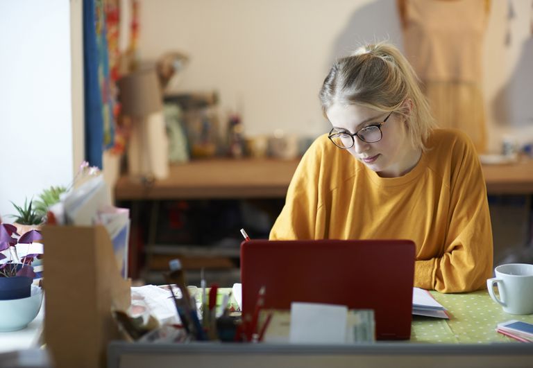Female student at home studying