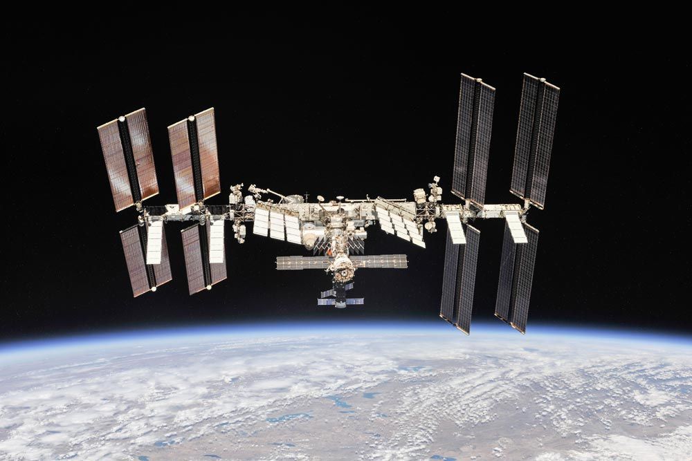 A photograph of the International Space Station in orbit around Earth.