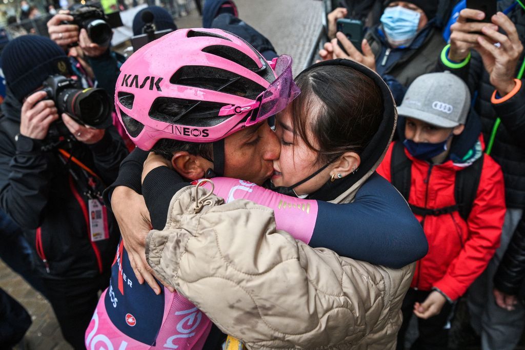 Overall leader Team Ineos rider Colombias Egan Bernal kisses his partner Maria Fernanda Motas after winning the 16th stage of the Giro dItalia 2021 cycling race 153km between Sacile and Cortina dAmpezzo on May 24 2021 Photo by Marco Alpozzi POOL AFP Photo by MARCO ALPOZZIPOOLAFP via Getty Images