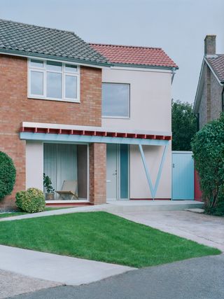 Triangle House by Artefact showing colour interiors and a graphic architectural approach that blends rawness and colour