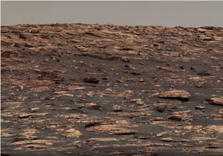 "Vera Rubin Ridge," a favored destination for NASA's Curiosity Mars rover even before the rover landed in 2012, rises near the rover nearly five years later in this panorama from Curiosity's Mastcam.