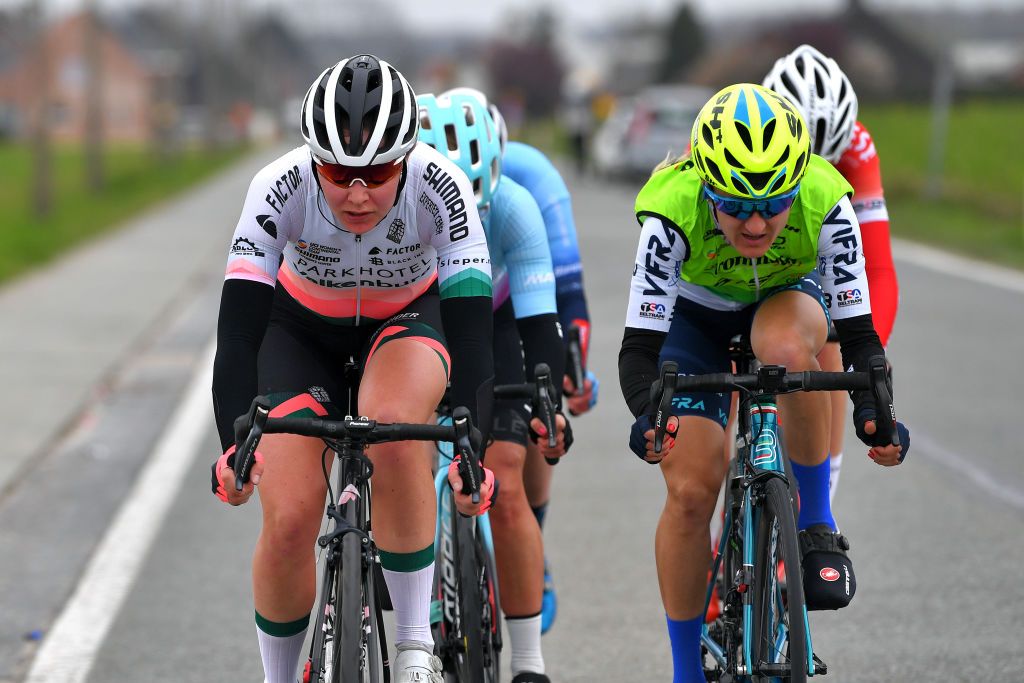 OUDENAARDE BELGIUM APRIL 04 Femke Markus of Netherlands and Team Parkhotel Valkenburg Inga Cesuliene of Lithuania and Team Aromitalia Basso Bikes Vaiano during the 18th Ronde van Vlaanderen Tour of Flanders 2021 Womens Elite a 1524km race frim Oudenaarde to Oudenaarde Breakaway RVV21 rondevanvlaanderen tourofflanders UCIWWT on April 04 2021 in Oudenaarde Belgium Photo by Luc ClaessenGetty Images