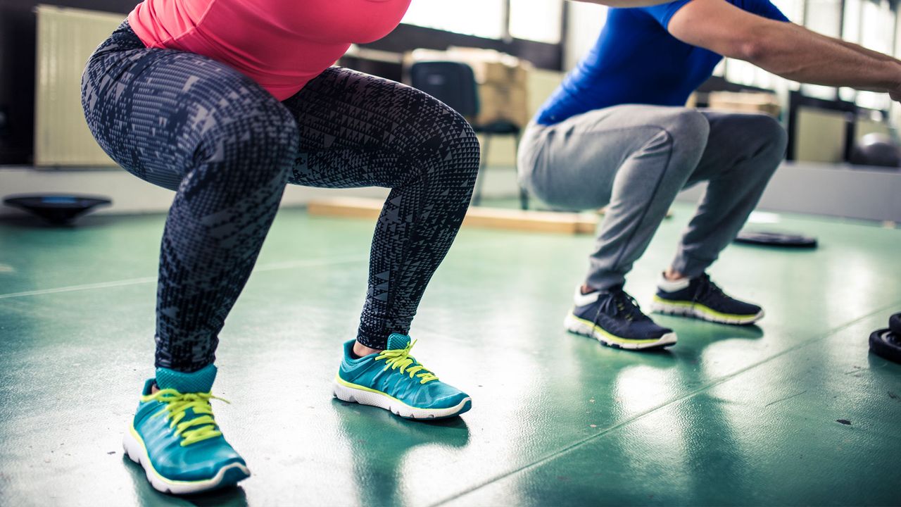 People performing squats