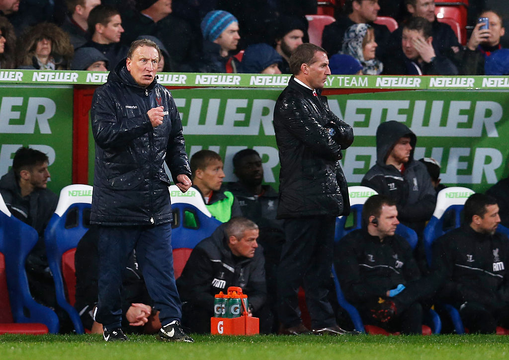 Neil Warnock and Brendan Rodgers in the dugout for Crystal Palace&#039;s victory over Liverpool in November 2014